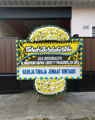 Papan Bunga Duka di Murni